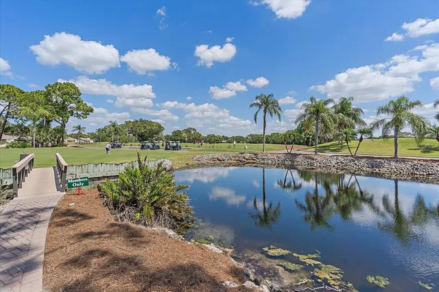 a view of a lake with a big yard