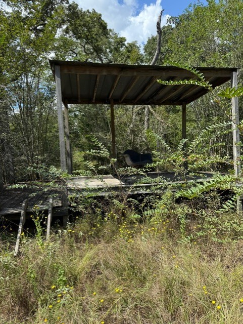 9522 Timberwilde Drive Bryan, TX 77808 - Photo 6 of 7 a view of a backyard