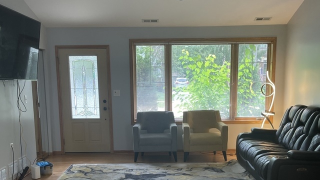 3845 McCormick Avenue Brookfield, IL 60513 - Photo 2 of 6 a living room with furniture and a window