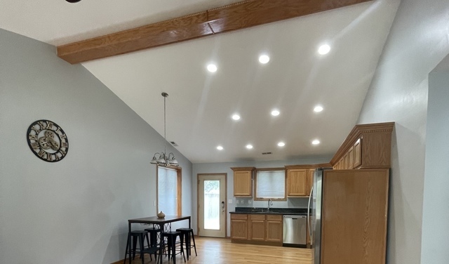 3845 McCormick Avenue Brookfield, IL 60513 - Photo 3 of 6 a view of kitchen with cabinets and refrigerator