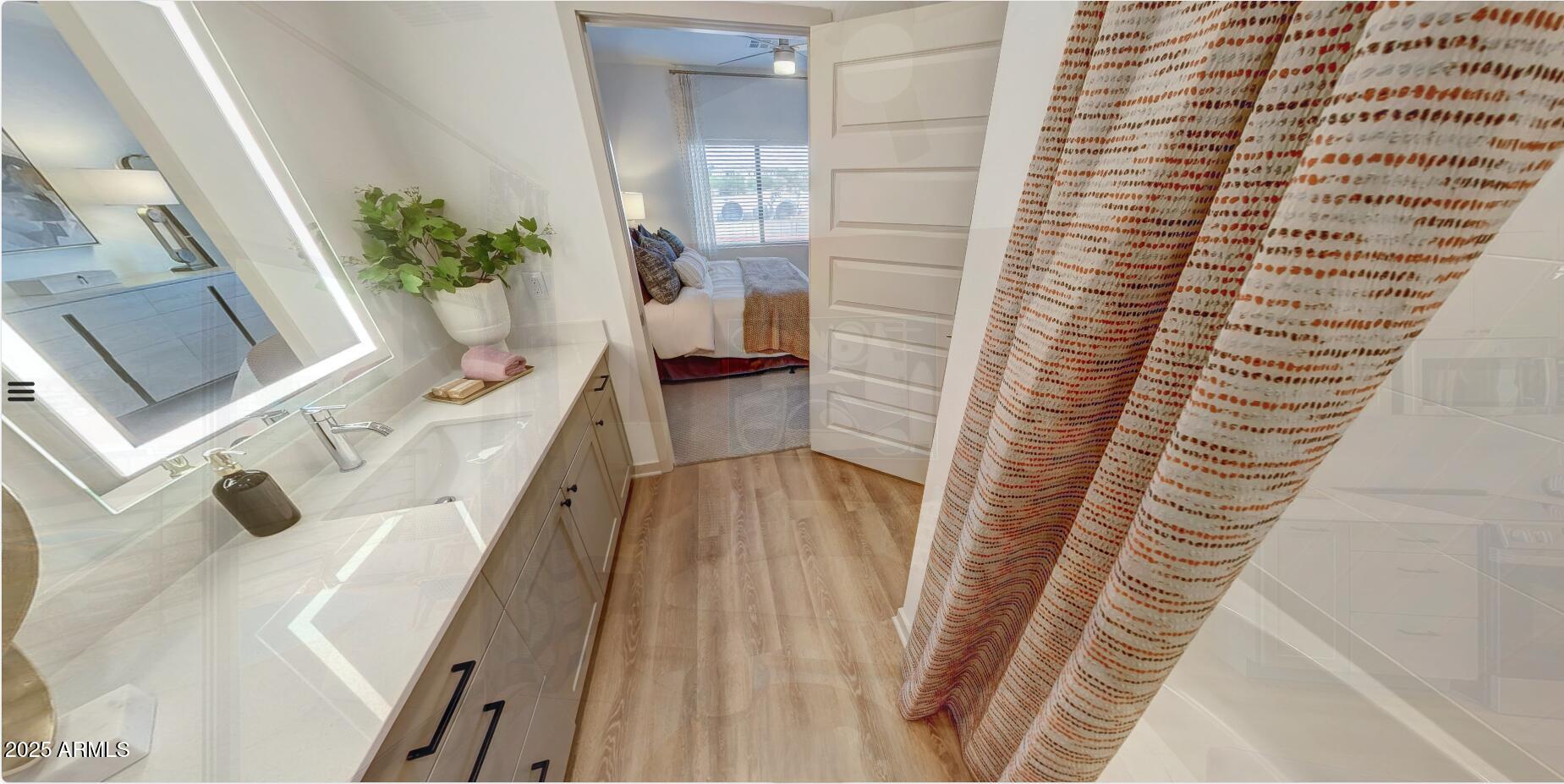 1225 North Arizona Avenue, Unit A2 1 Gilbert, AZ 85233 - Photo 6 of 17 a view of a balcony with wooden floor