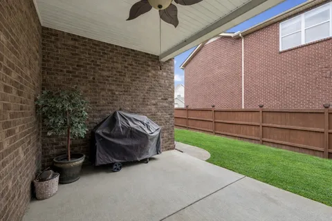 a view of backyard with cabin