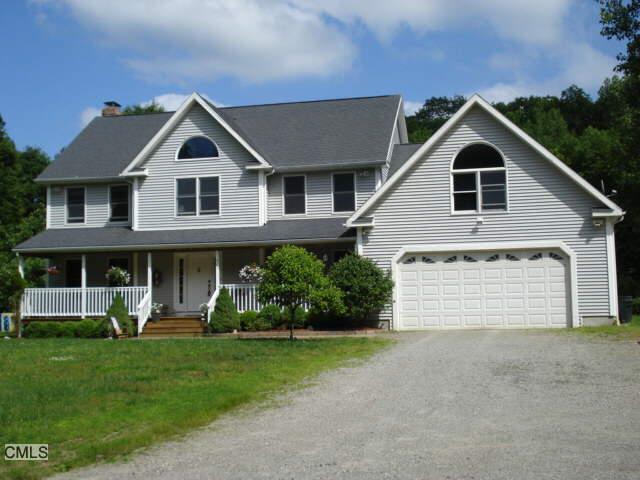 427 Hammertown Road Monroe, CT 06468 - Photo 1 of 1 a front view of a house with a yard