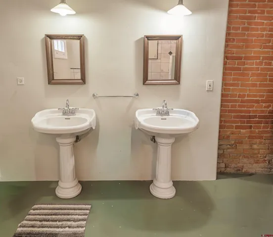 a bedroom with a bed and a walk in closet