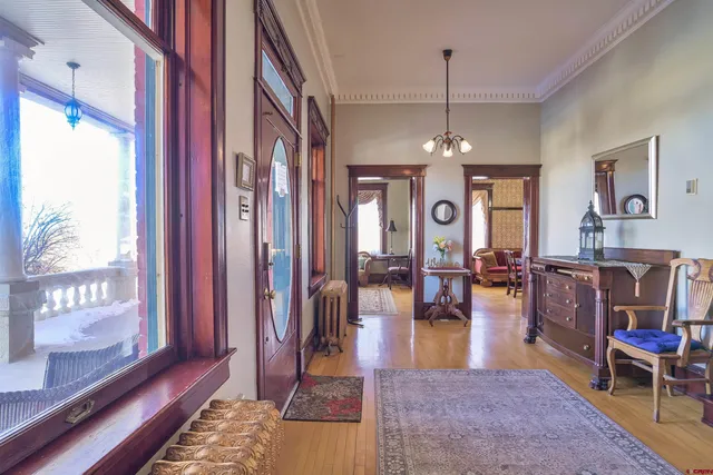 a view of an entryway and dining room