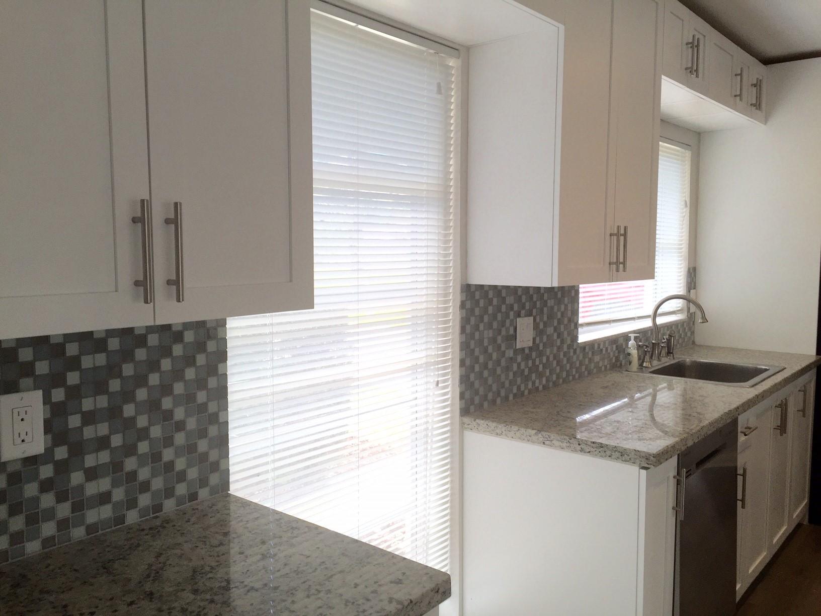 113 Park Lane East Lake Worth, FL 33462 - Photo 6 of 19 Open kitchen - left of front door