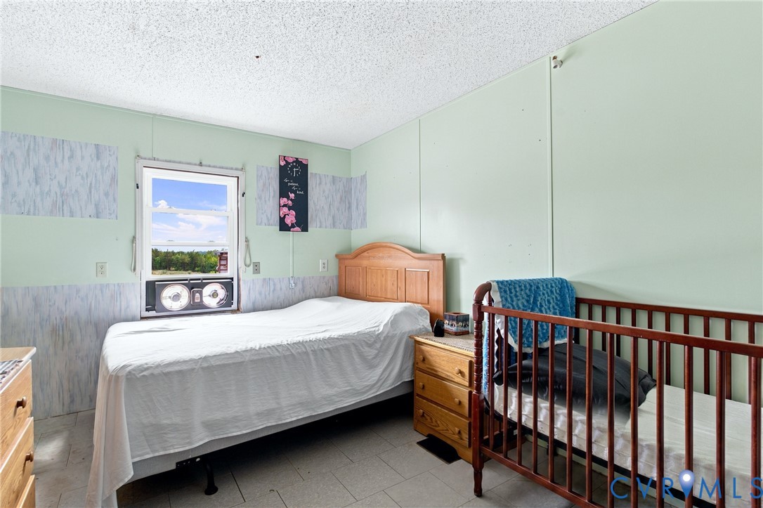 1451 Dixie Hill Road Dillwyn, VA 23936 - Photo 15 of 51 Bright room with a window providing outdoor scener