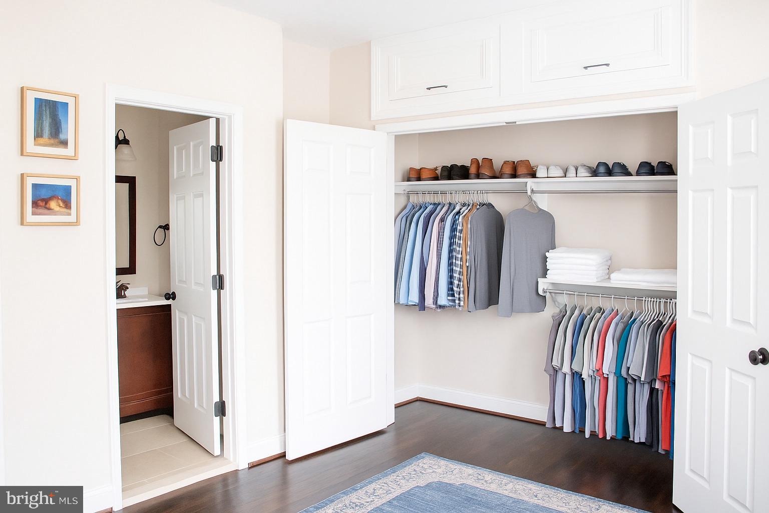 749 Gresham Place Northwest Washington, DC 20001 - Photo 12 of 20 a view of walk in closet with clothes and shoes