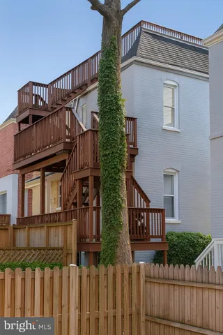 a view of balcony with chairs