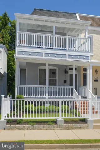 a view of a house with a deck