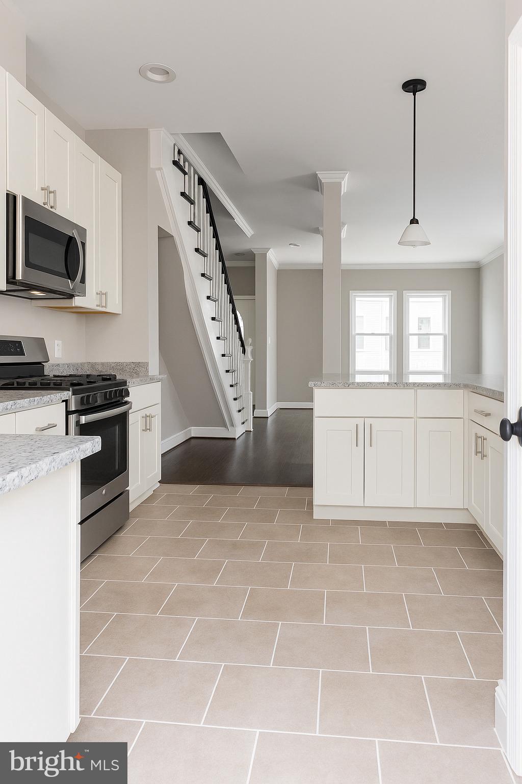 749 Gresham Place Northwest Washington, DC 20001 - Photo 7 of 20 a view of a kitchen with microwave and cabinets