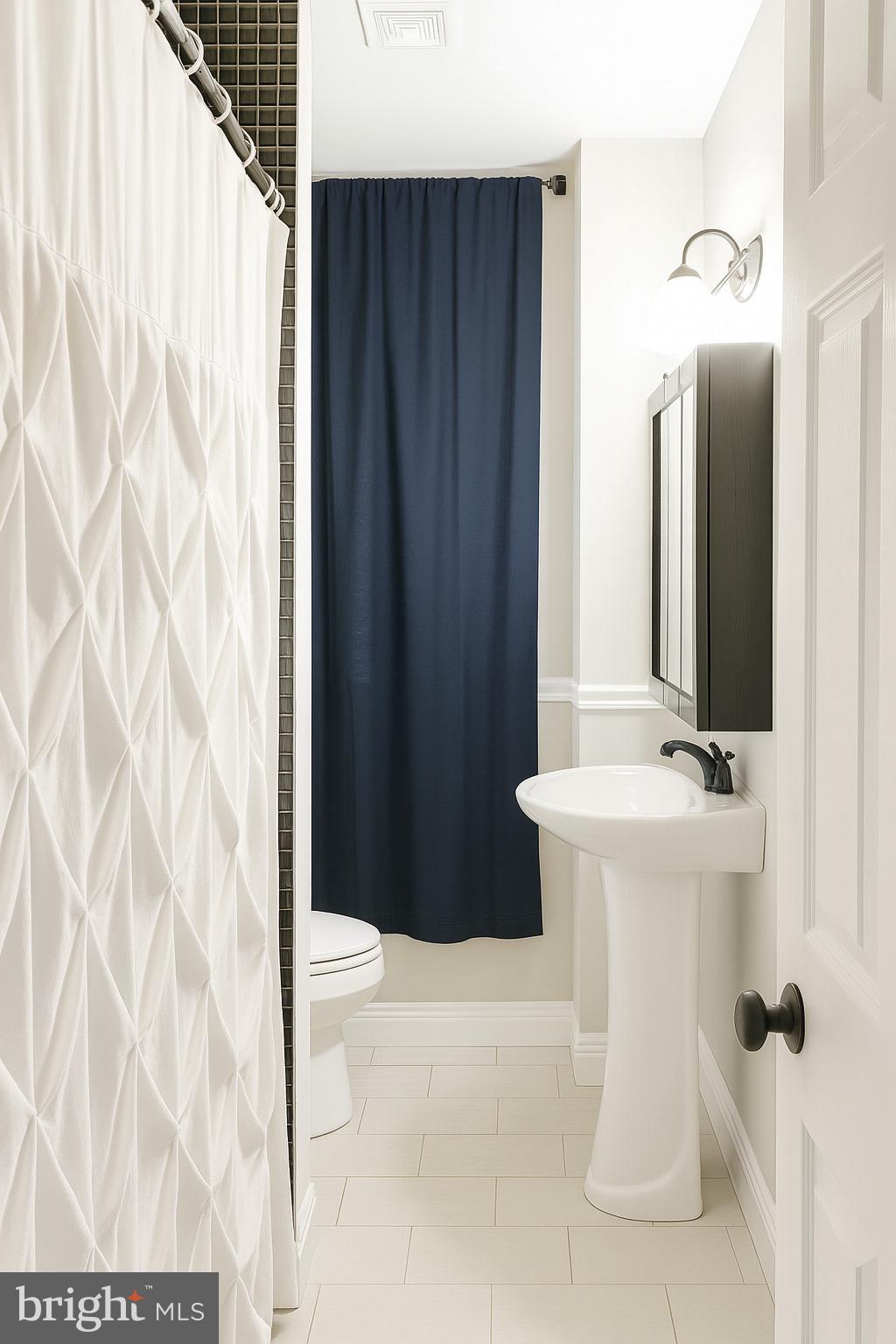 749 Gresham Place Northwest Washington, DC 20001 - Photo 10 of 20 a bathroom with a sink toilet and shower