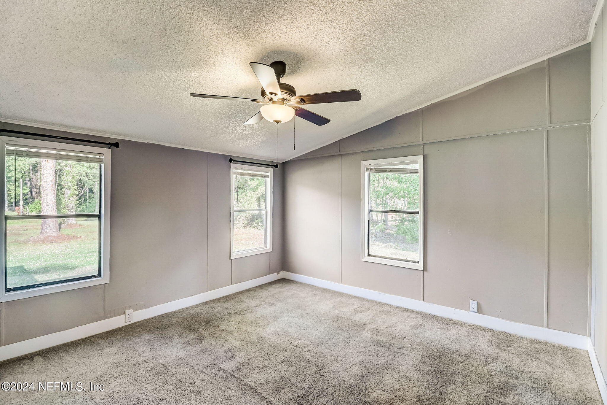 54262 Vikki Road Callahan, FL 32011 - Photo 15 of 48 a view of an empty room with a window