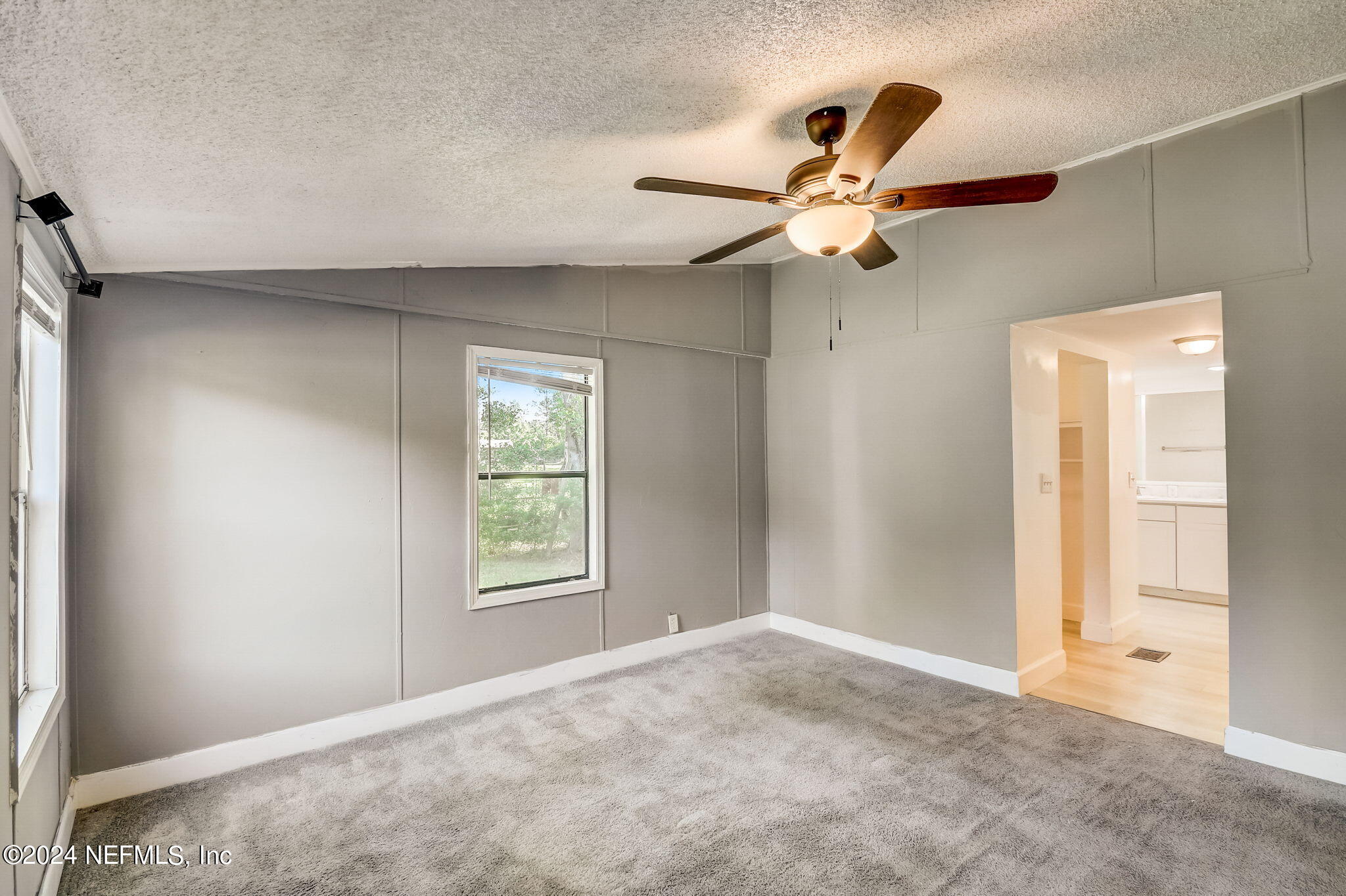 54262 Vikki Road Callahan, FL 32011 - Photo 16 of 48 a view of an empty room with a window