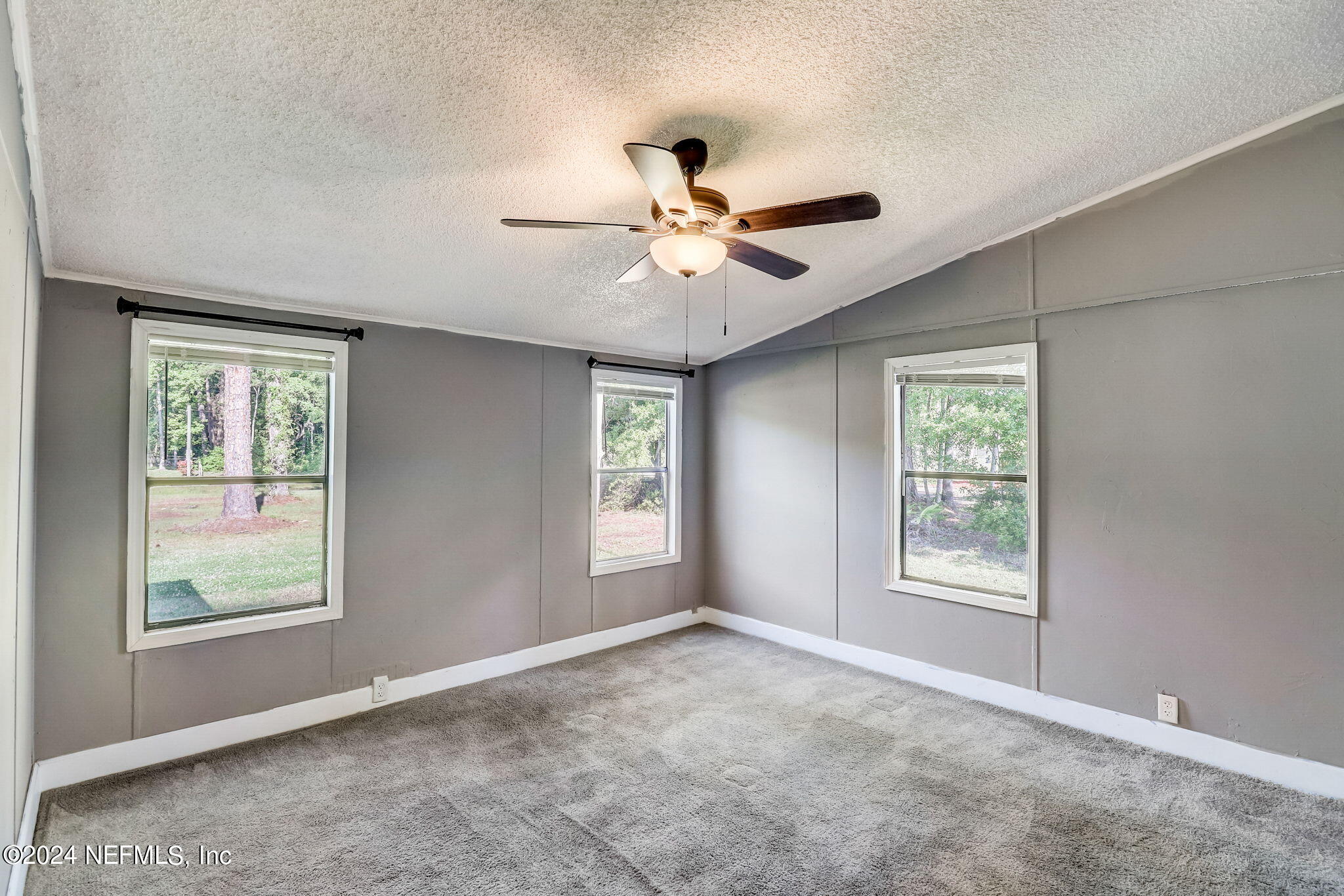 54262 Vikki Road Callahan, FL 32011 - Photo 20 of 48 a view of an empty room with a window