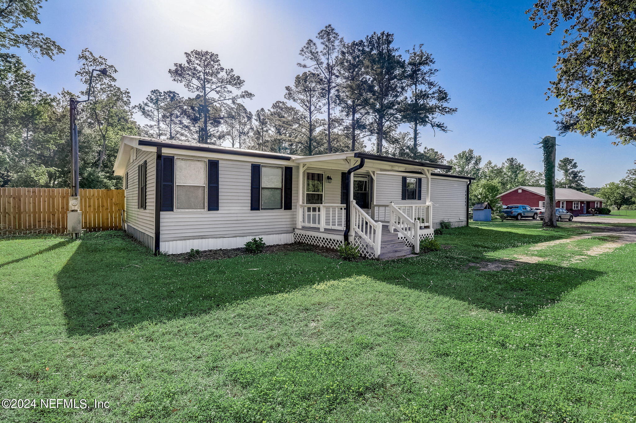 54262 Vikki Road Callahan, FL 32011 - Photo 2 of 48 a view of a house with backyard
