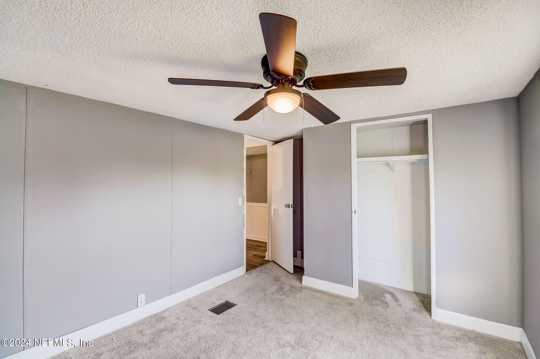 54262 Vikki Road Callahan, FL 32011 - Photo 25 of 48 a view of a chandelier fan