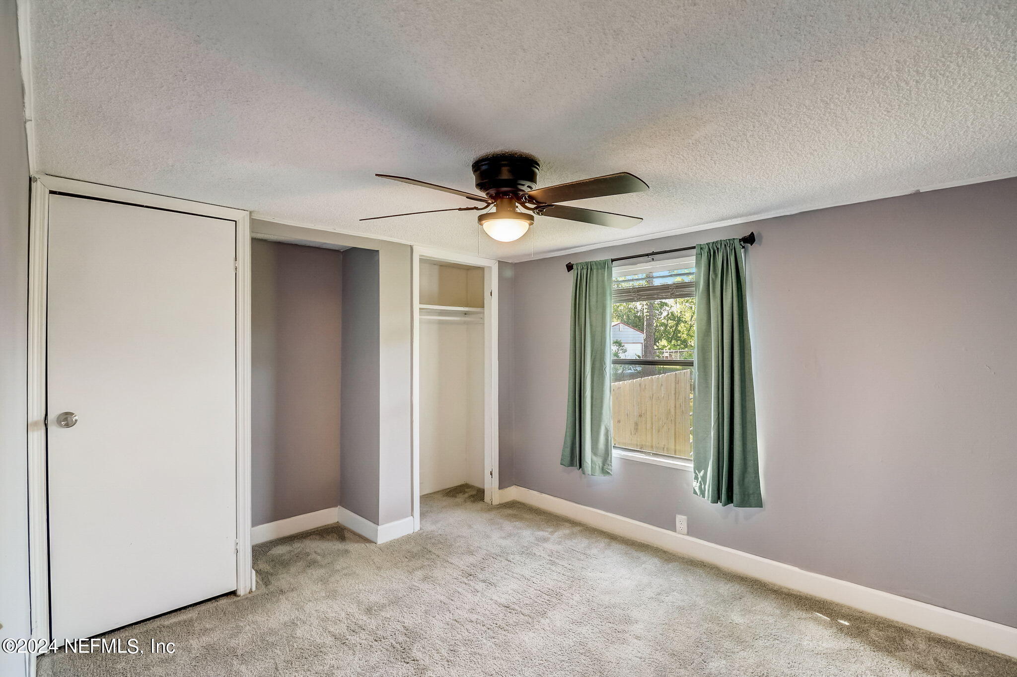 54262 Vikki Road Callahan, FL 32011 - Photo 28 of 48 a view of an empty room with a window