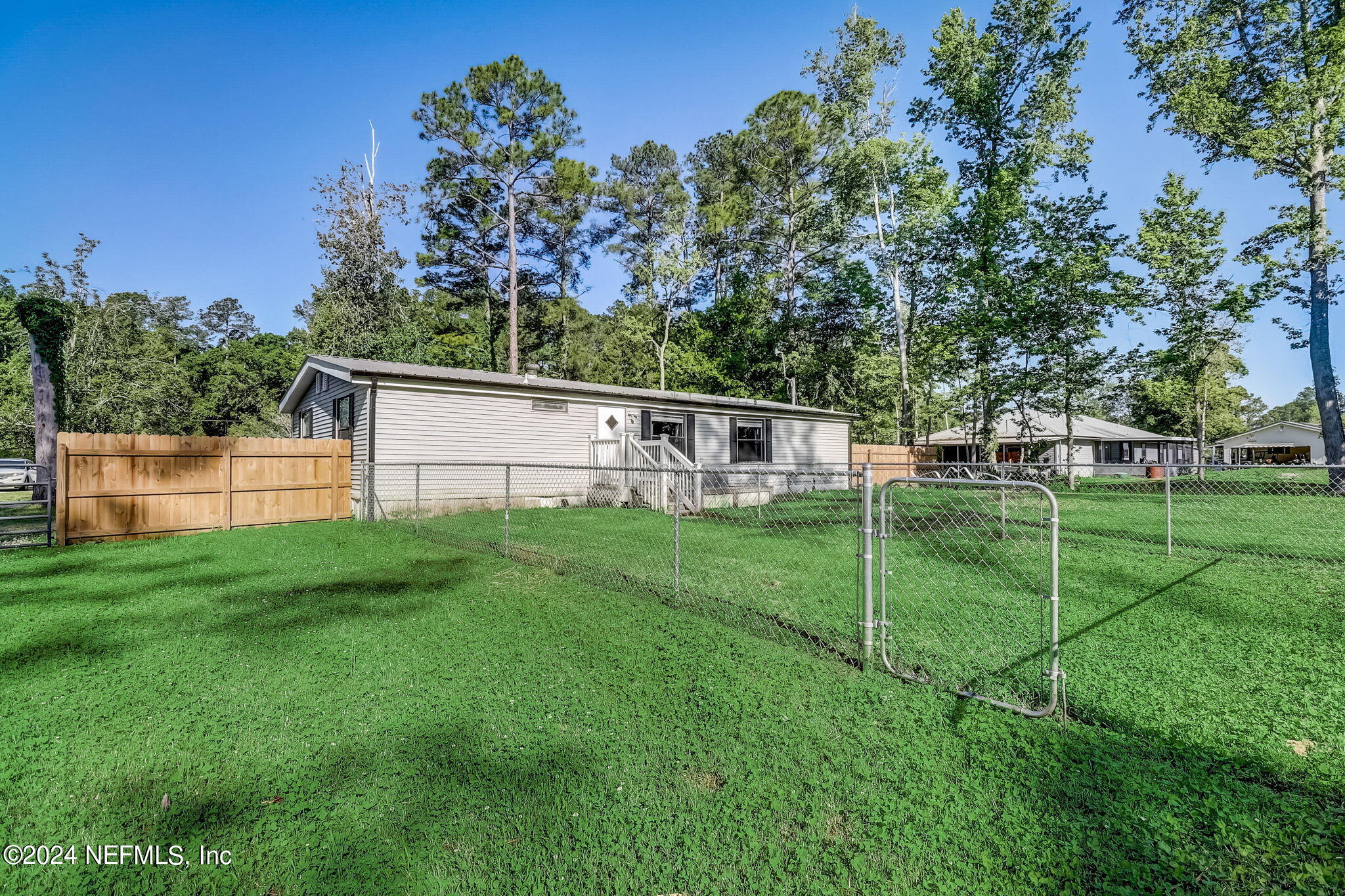 54262 Vikki Road Callahan, FL 32011 - Photo 30 of 48 a view of backyard with green space
