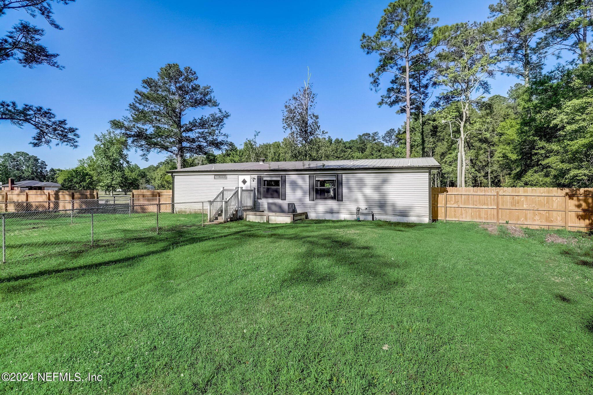 54262 Vikki Road Callahan, FL 32011 - Photo 32 of 48 a view front of house with a yard
