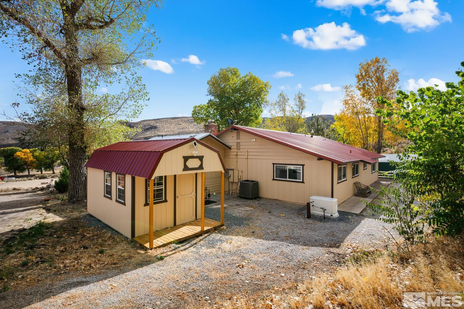 14005 North Red Rock Road Reno, NV 89508 - Photo 11 of 39 a view of a house with a yard