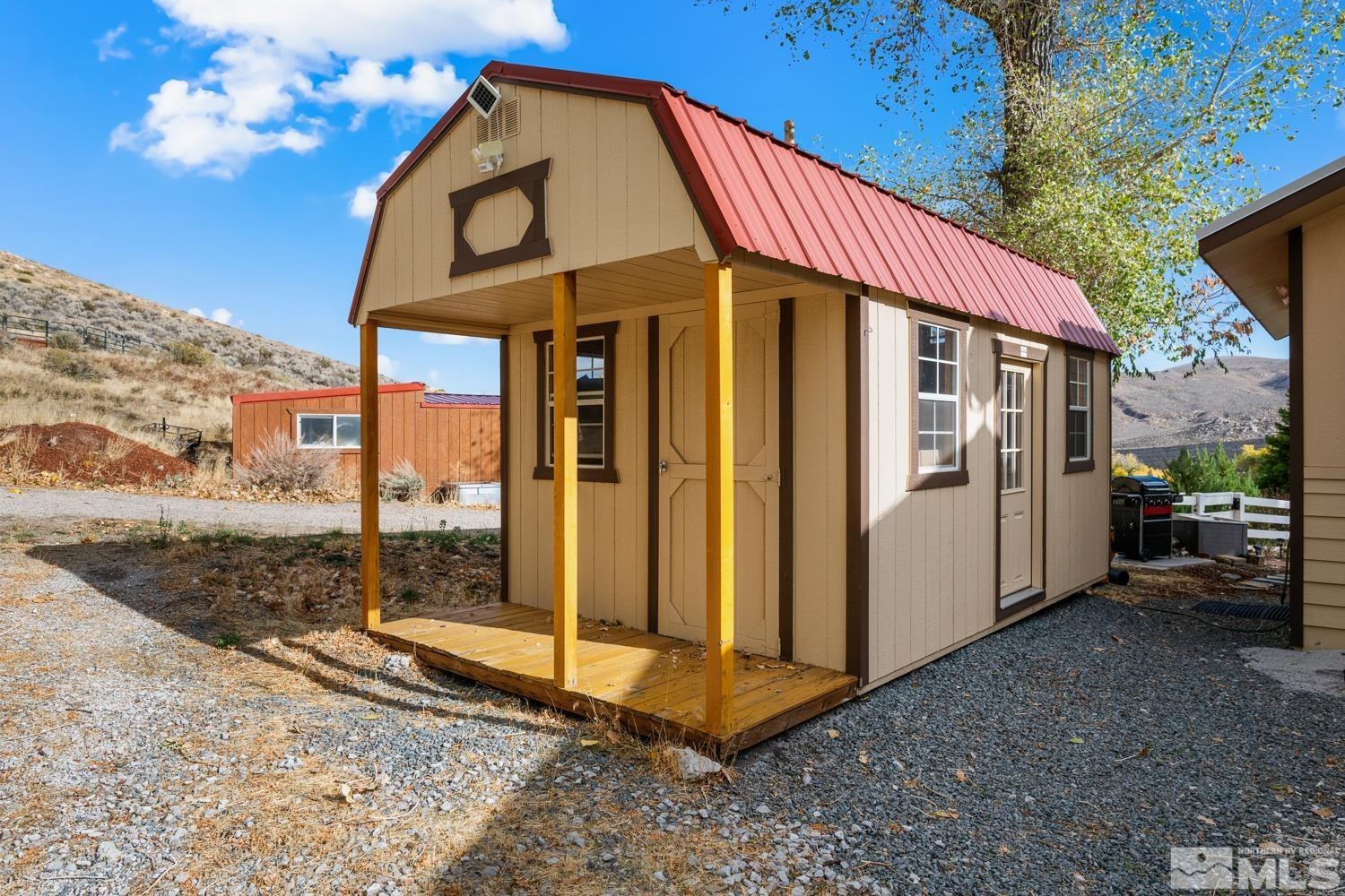 14005 North Red Rock Road Reno, NV 89508 - Photo 12 of 39 a view of a house with a yard