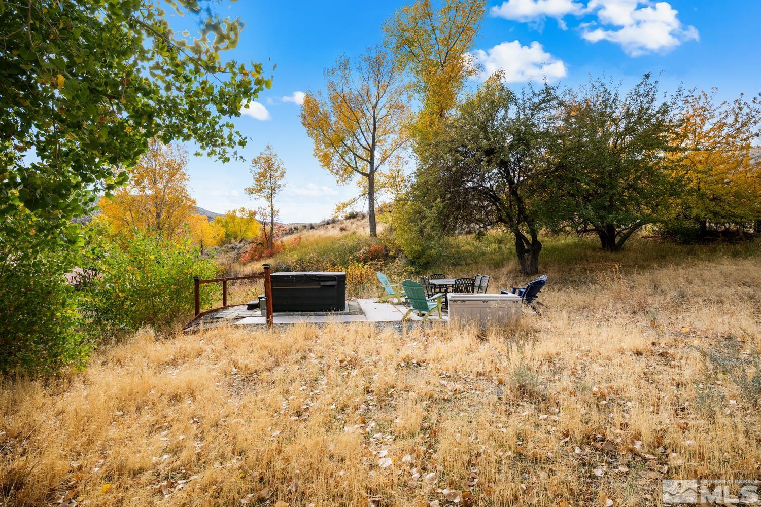 14005 North Red Rock Road Reno, NV 89508 - Photo 37 of 39 a view of a backyard with a patio