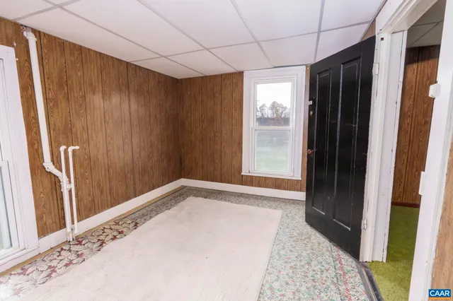 a kitchen with stainless steel appliances a refrigerator and a refrigerator