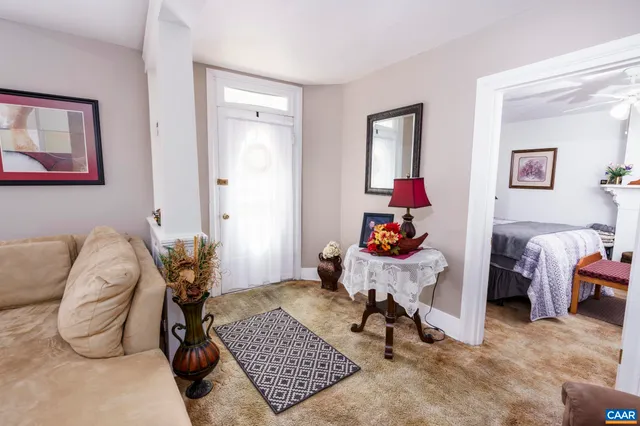 a room with furniture and wooden floor