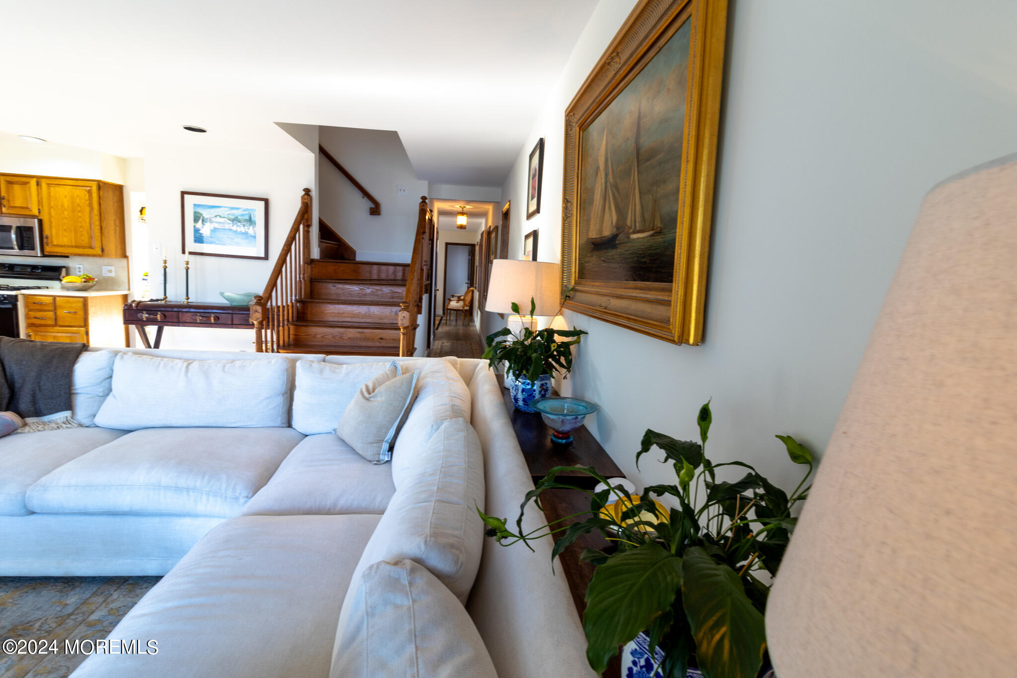 565 Princeton Avenue Brick, NJ 08724 - Photo 19 of 66 a living room with furniture and a painting on the wall