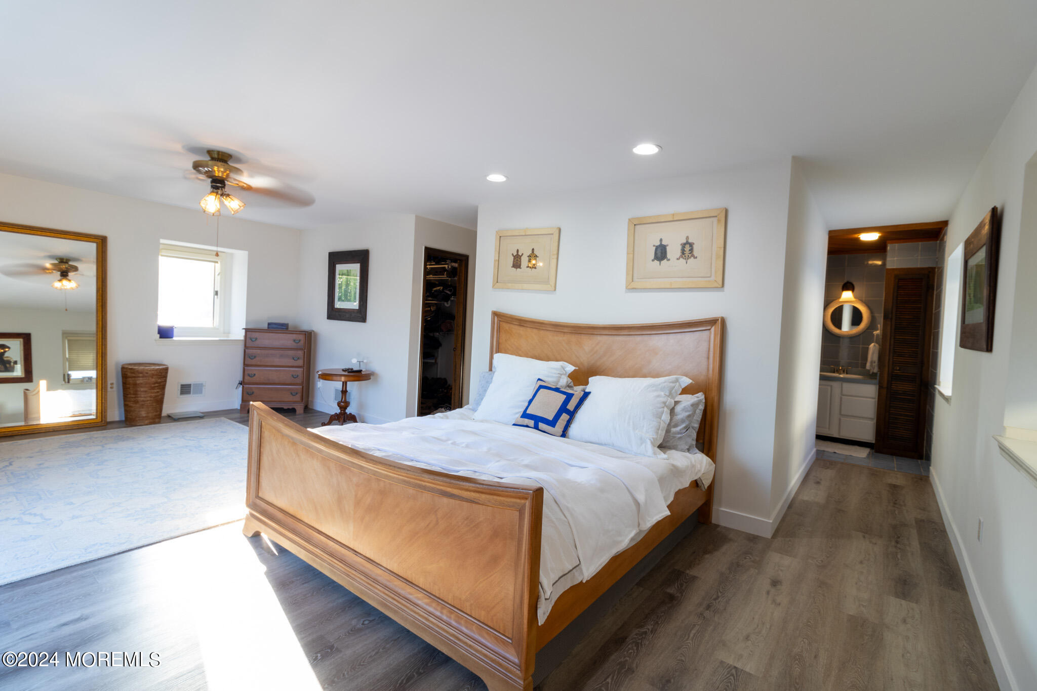 565 Princeton Avenue Brick, NJ 08724 - Photo 29 of 66 a bedroom with a bed and a lamp