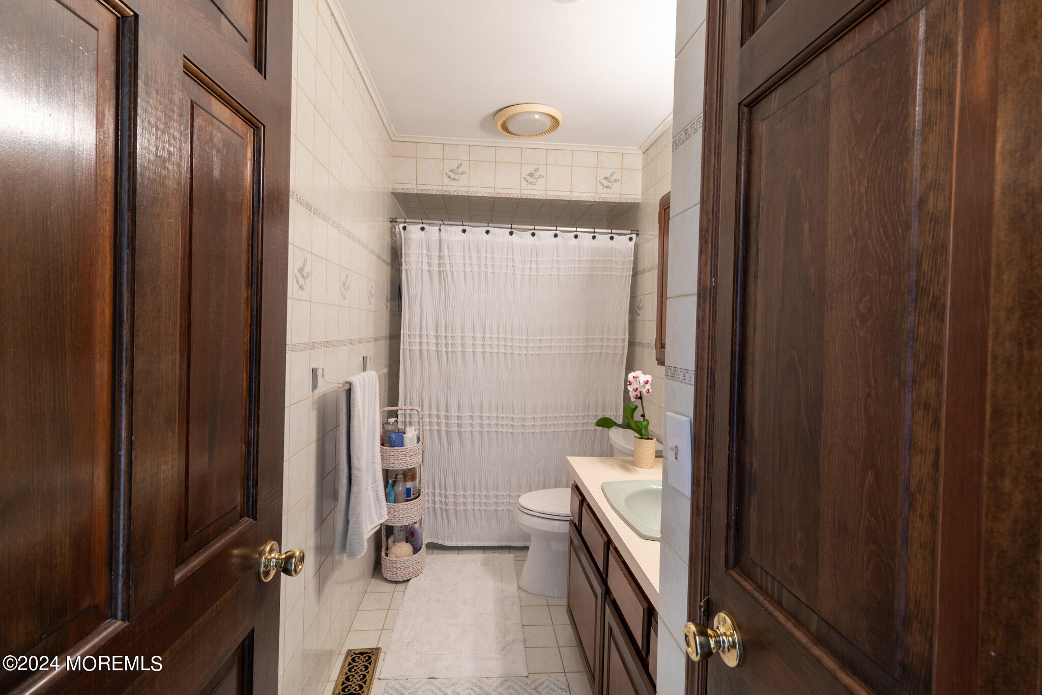 565 Princeton Avenue Brick, NJ 08724 - Photo 35 of 66 a bathroom with a tub and a shower