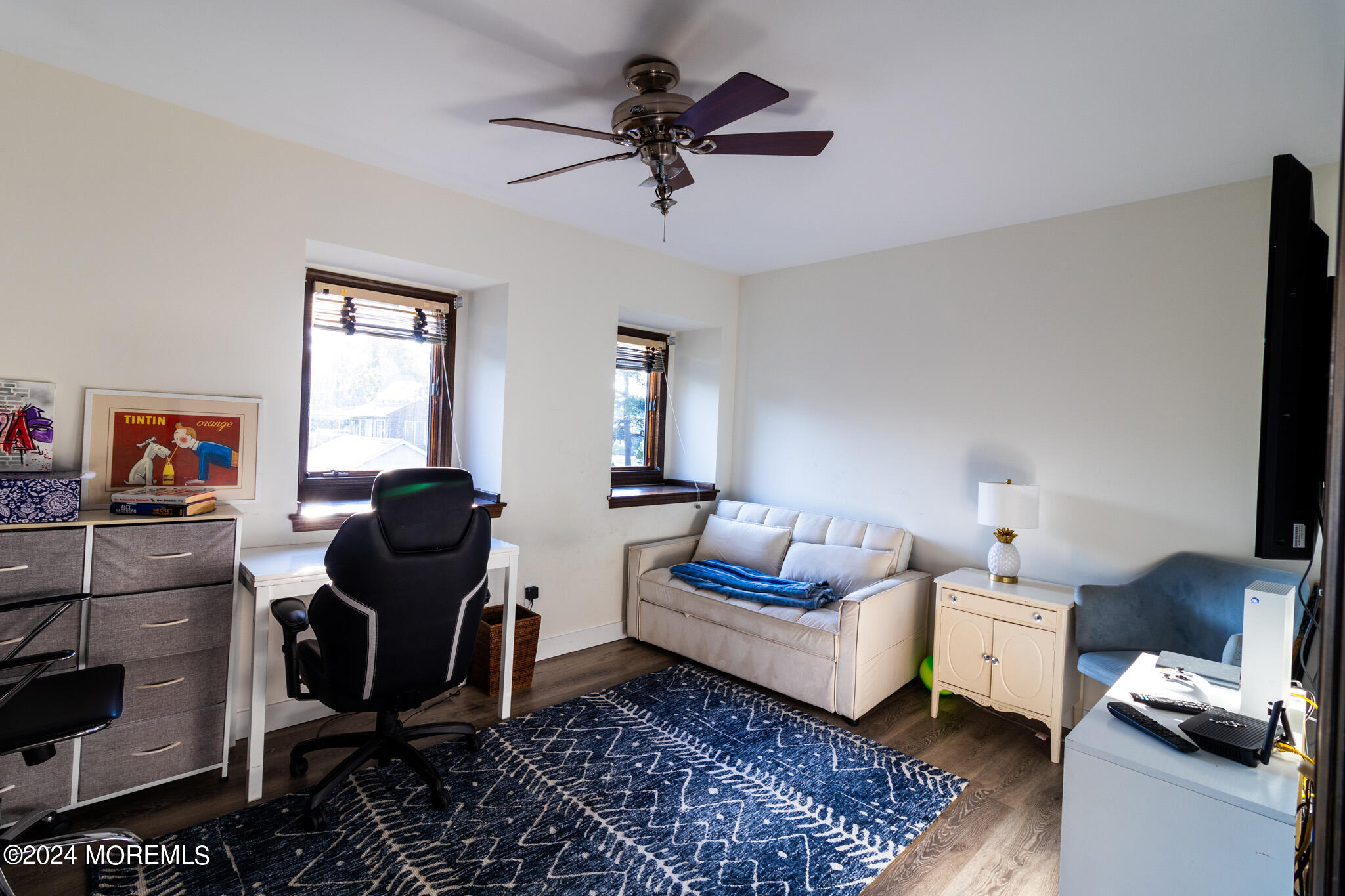 565 Princeton Avenue Brick, NJ 08724 - Photo 36 of 66 a living room with furniture and a flat screen tv