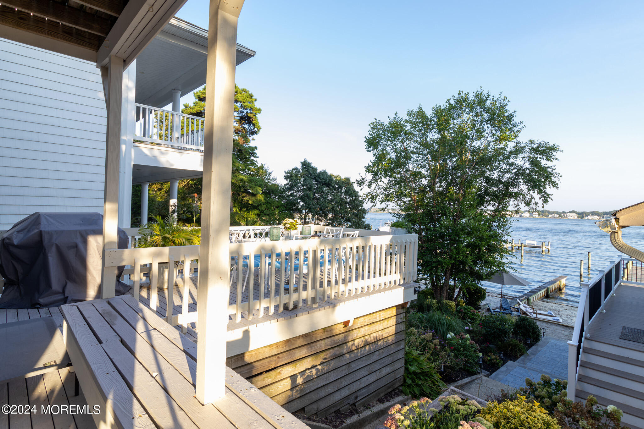 565 Princeton Avenue Brick, NJ 08724 - Photo 39 of 66 a view of balcony with wooden floor and outdoor seating