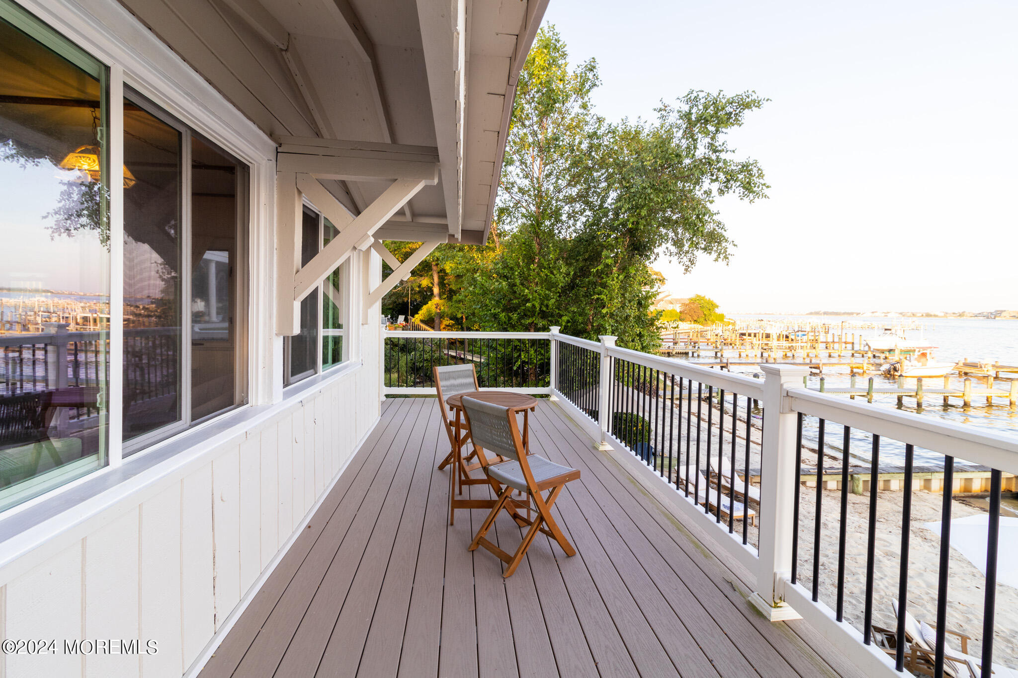 565 Princeton Avenue Brick, NJ 08724 - Photo 45 of 66 a view of balcony with furniture and wooden floor