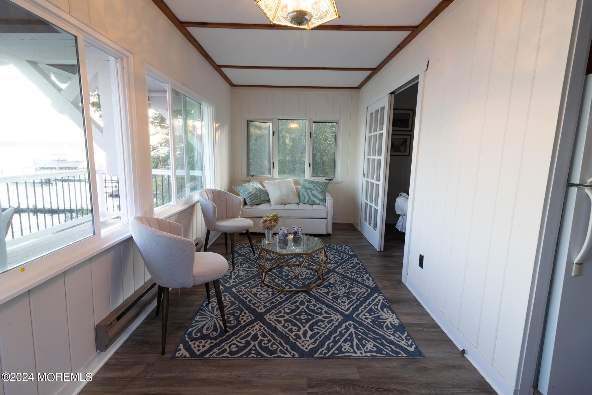 565 Princeton Avenue Brick, NJ 08724 - Photo 48 of 66 a living room with furniture and a rug