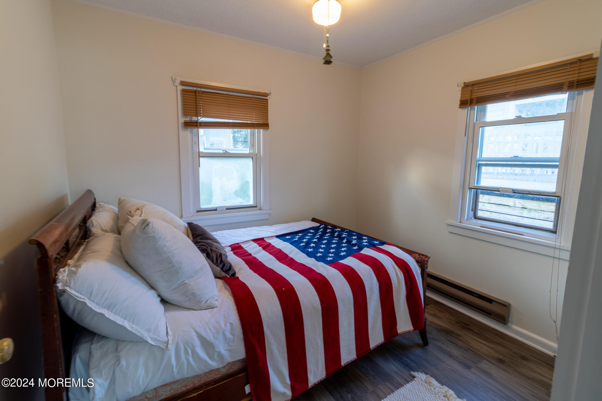 565 Princeton Avenue Brick, NJ 08724 - Photo 53 of 66 a bedroom with a bed and a window