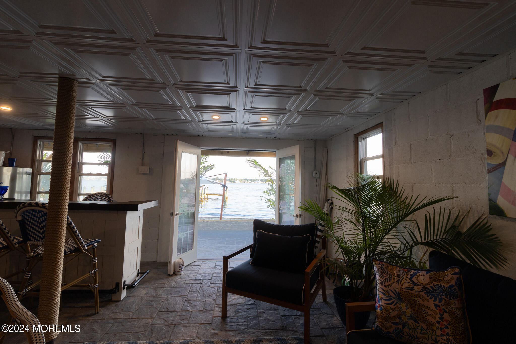 565 Princeton Avenue Brick, NJ 08724 - Photo 55 of 66 a living room with furniture and a potted plant