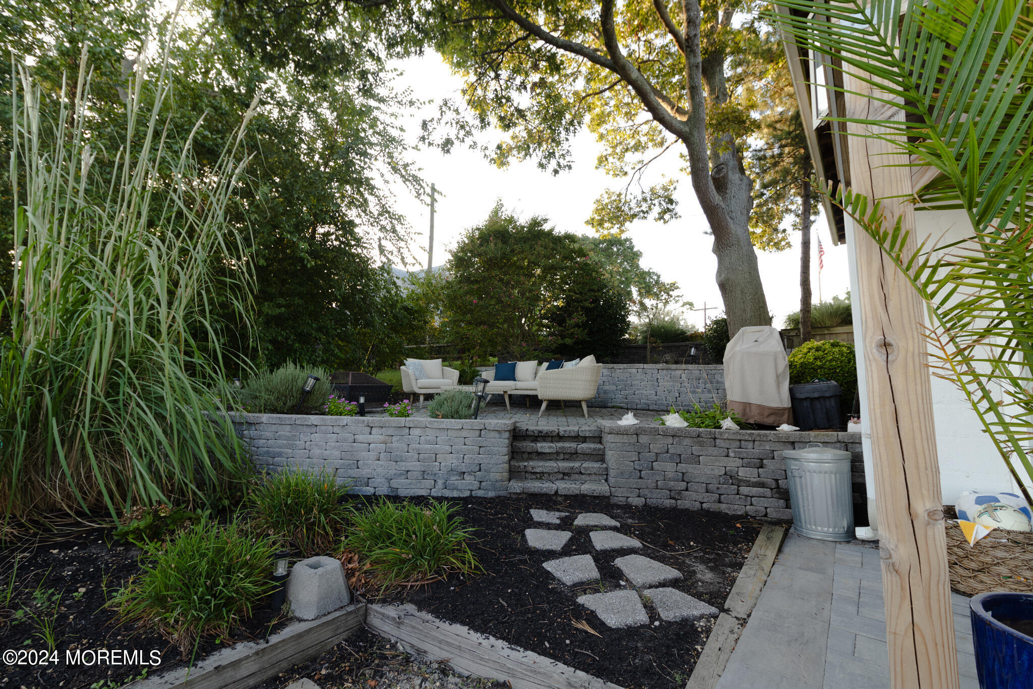 565 Princeton Avenue Brick, NJ 08724 - Photo 62 of 66 a view of backyard with outdoor seating and plants