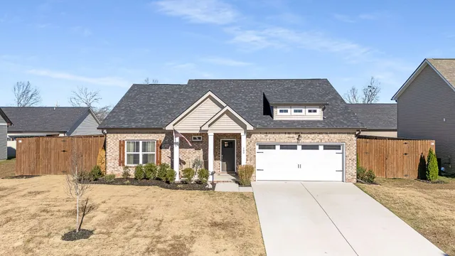 front view of a house with a patio