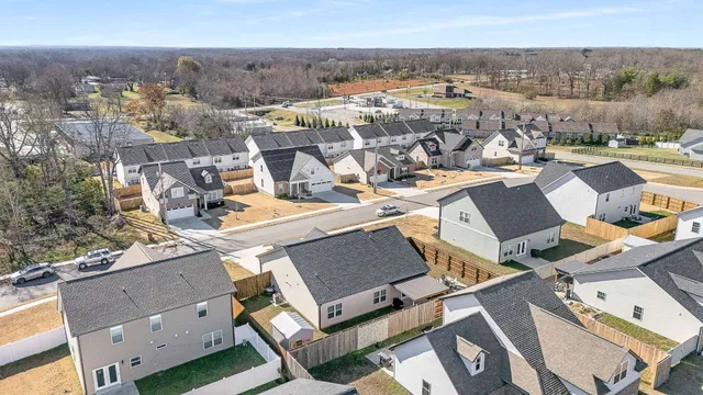 an aerial view of a city with lots of residential buildings