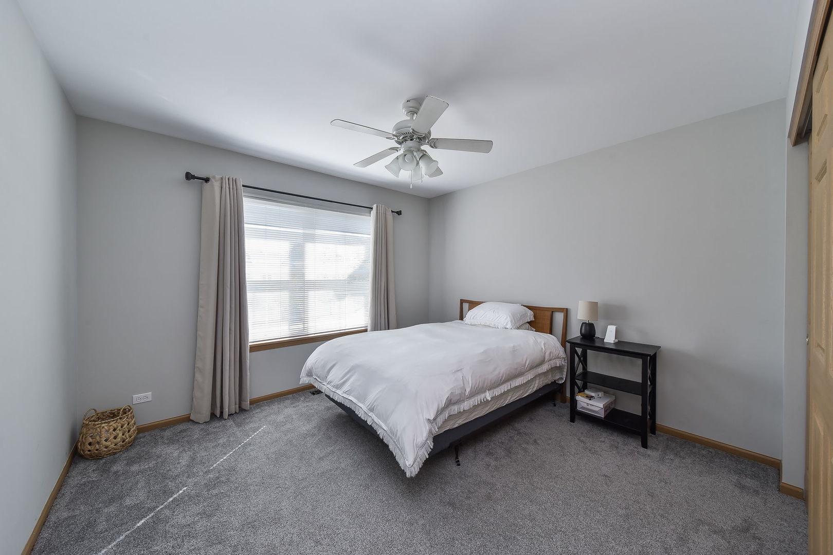 247 Grand Ridge Road St. Charles, IL 60175 - Photo 11 of 17 a bedroom with a bed and a window