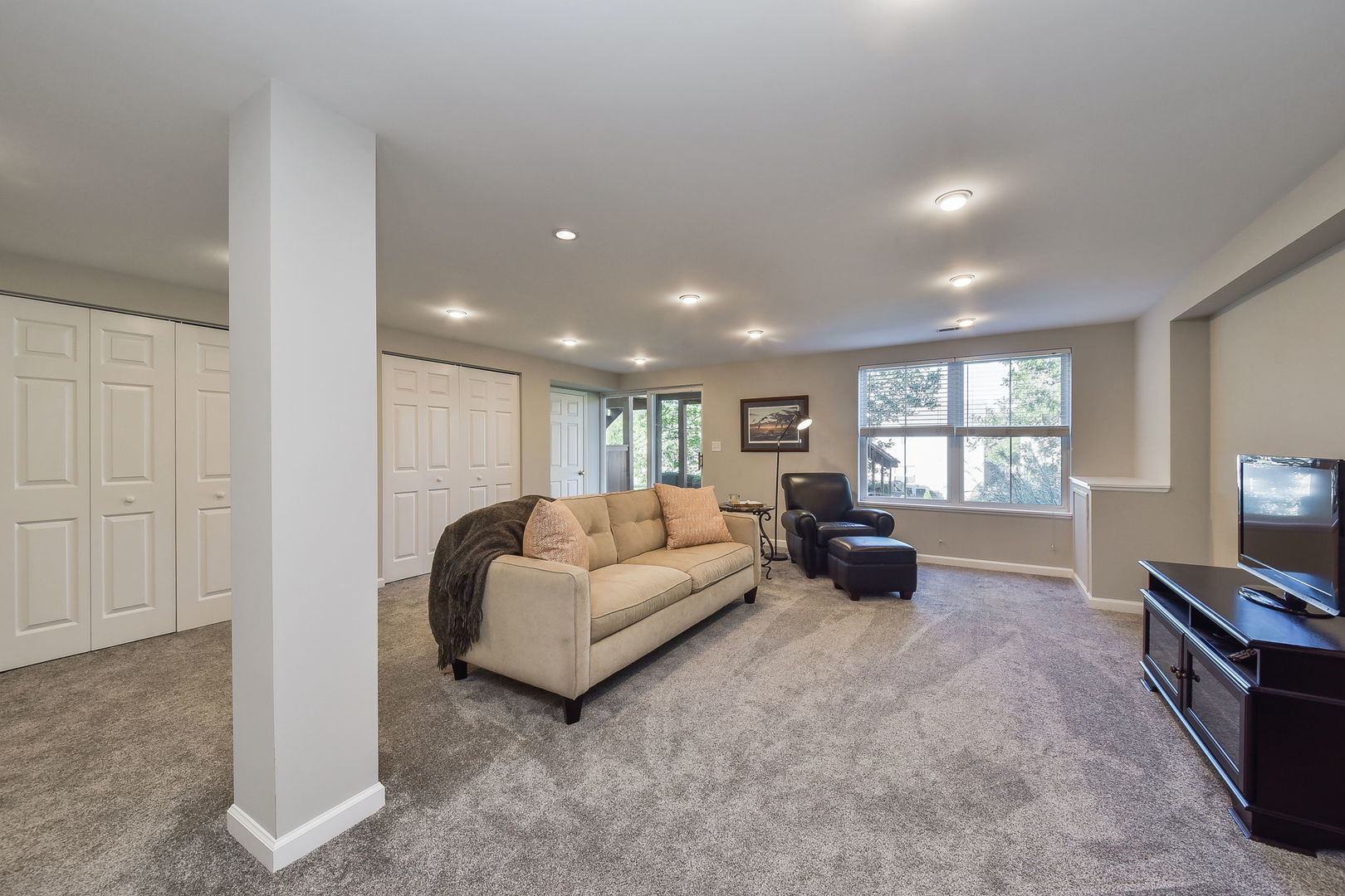 247 Grand Ridge Road St. Charles, IL 60175 - Photo 13 of 17 a living room with furniture and a large window