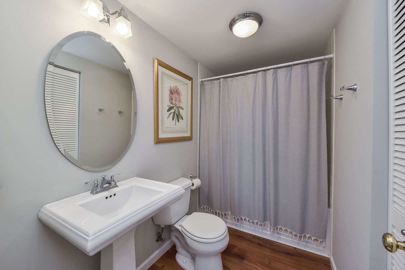 247 Grand Ridge Road St. Charles, IL 60175 - Photo 14 of 17 a bathroom with a toilet a sink and a mirror
