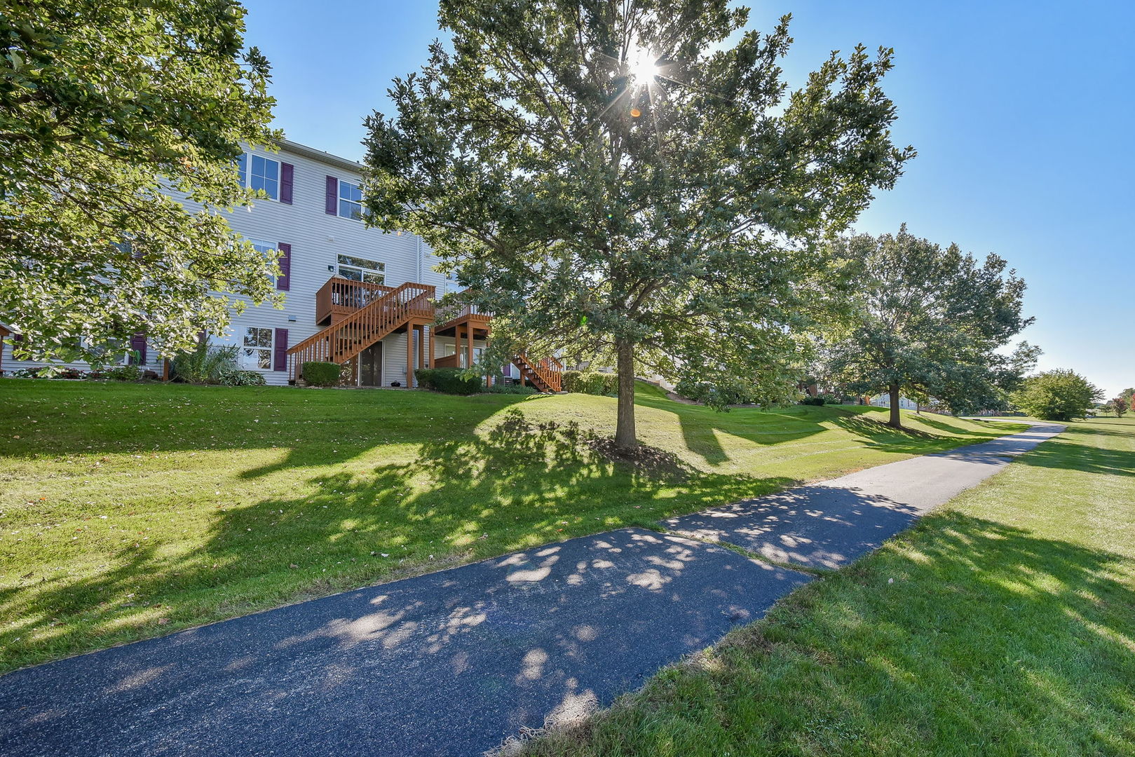 247 Grand Ridge Road St. Charles, IL 60175 - Photo 17 of 17 a view of a garden with a house