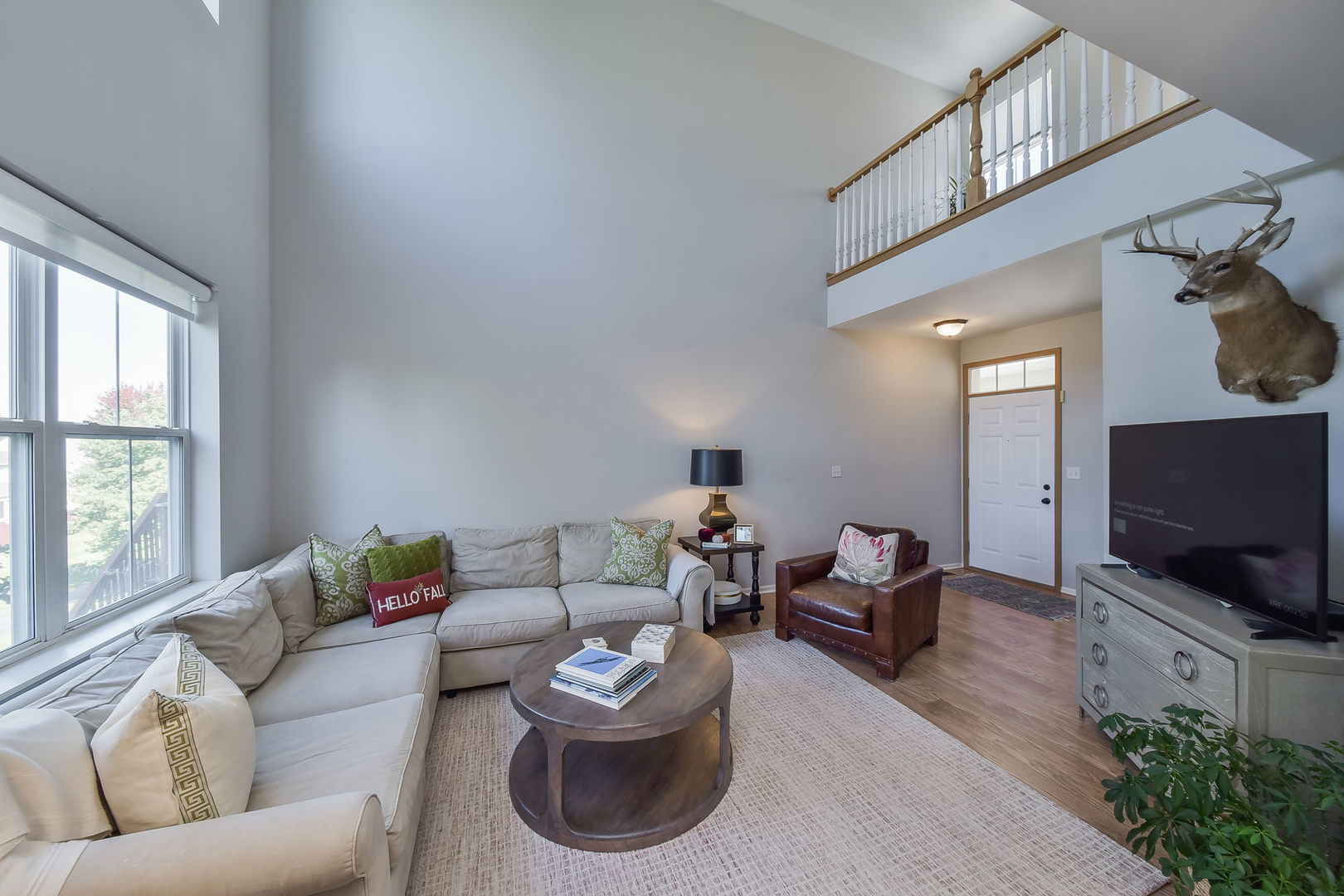 247 Grand Ridge Road St. Charles, IL 60175 - Photo 3 of 17 a living room with furniture and a flat screen tv