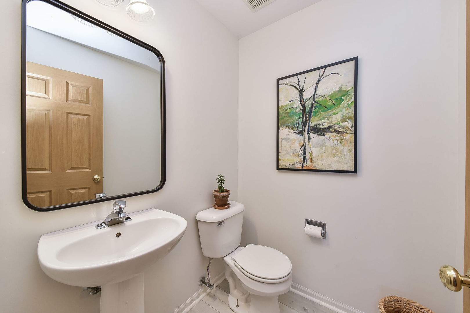247 Grand Ridge Road St. Charles, IL 60175 - Photo 7 of 17 a bathroom with a toilet a sink and mirror