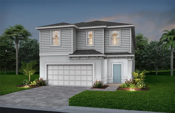 front view of a house with a yard