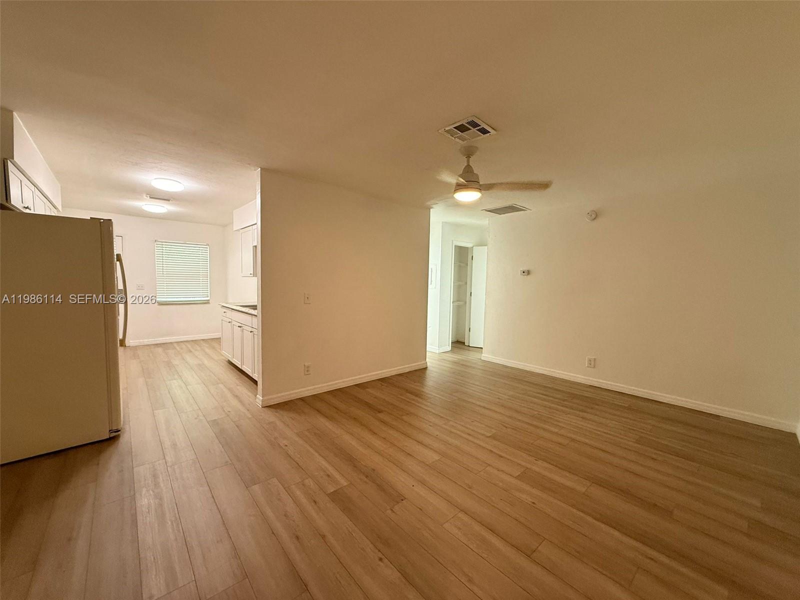 2919 Jackson Street, Unit 4 Fort Myers, FL 33901 - Photo 3 of 13 a view of a livingroom with wooden floor