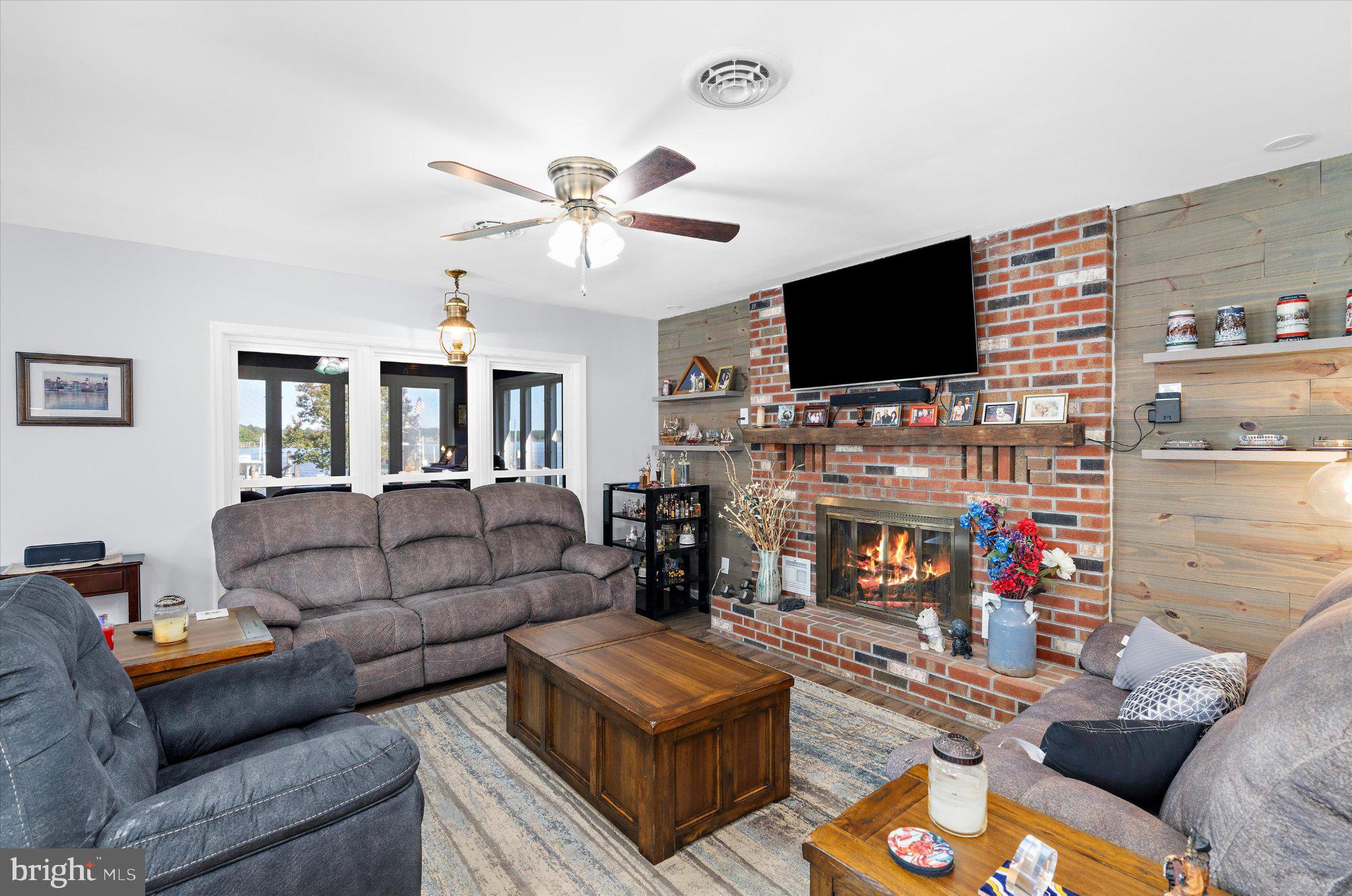 1609 Deep Point Road Woolford, MD 21677 - Photo 8 of 57 Cozy living room with rustic charm.